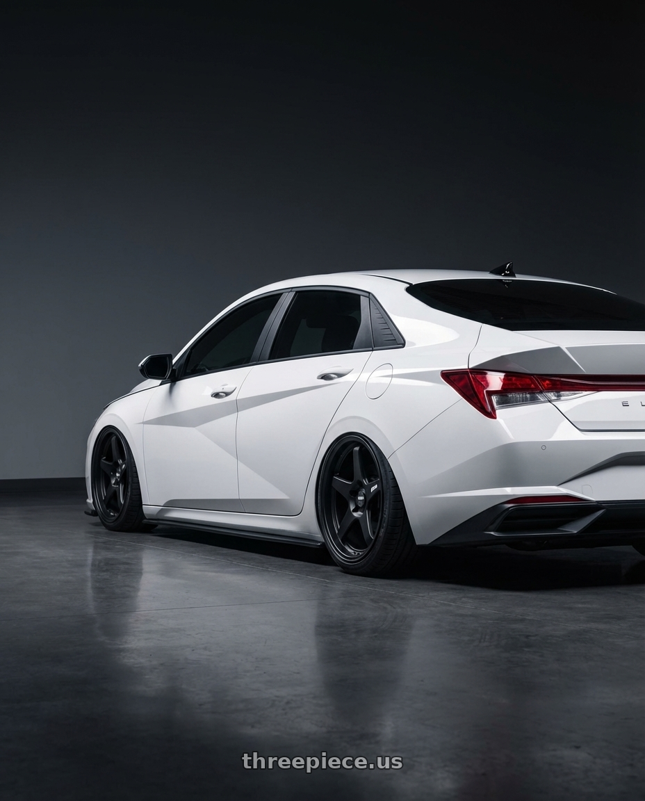 2024 Hyundai Elantra N with ESR Wheels APEX SERIES AP5 5x114.3 19x9.5 +22 Matte Black wheels rear three quarter view slight stretch tires