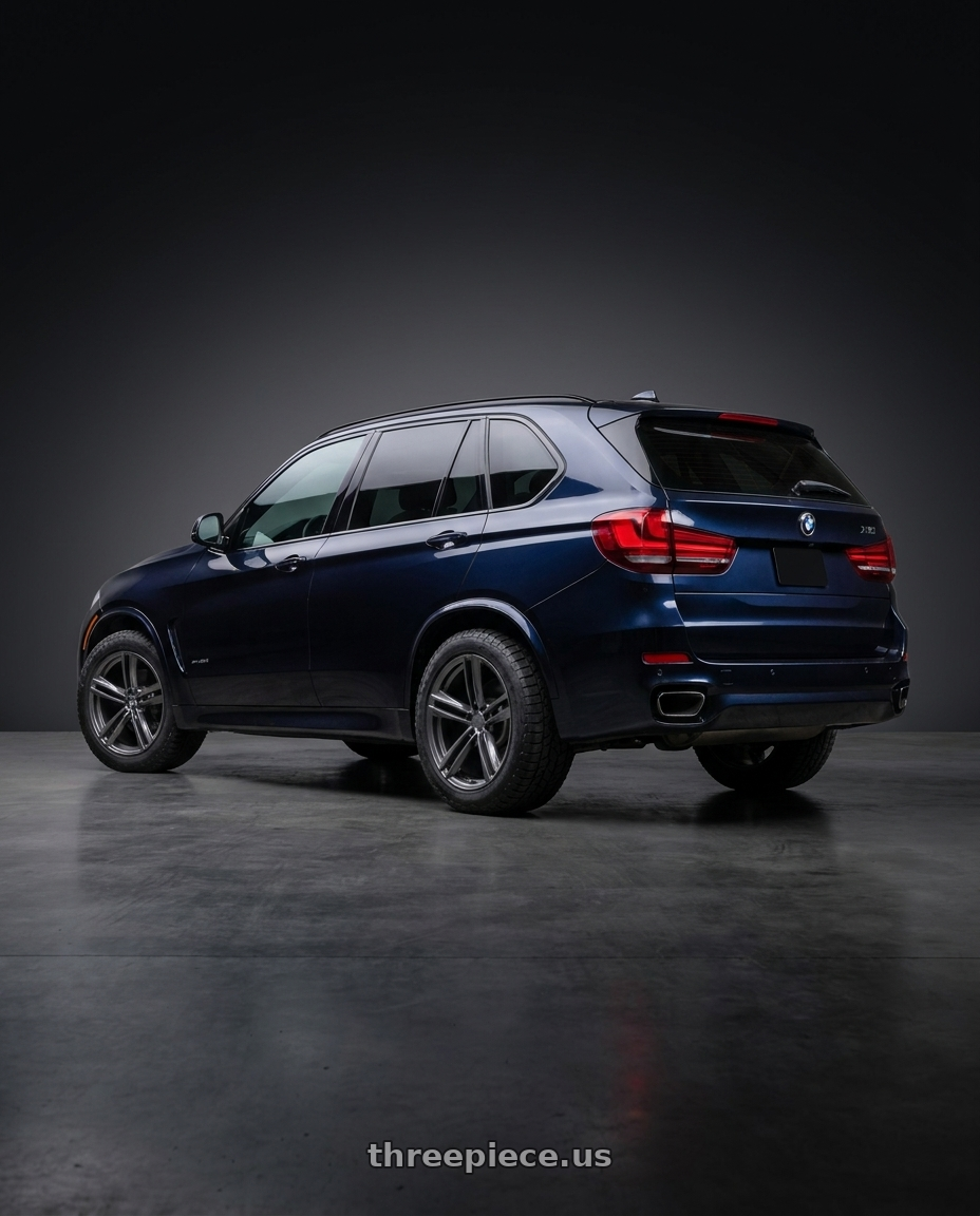 2014 BMW X5 M sport with OHM LIGHTNING 5X120 20X10 +35 GLOSS GUNMETAL wheels rear three quarter view meaty tires