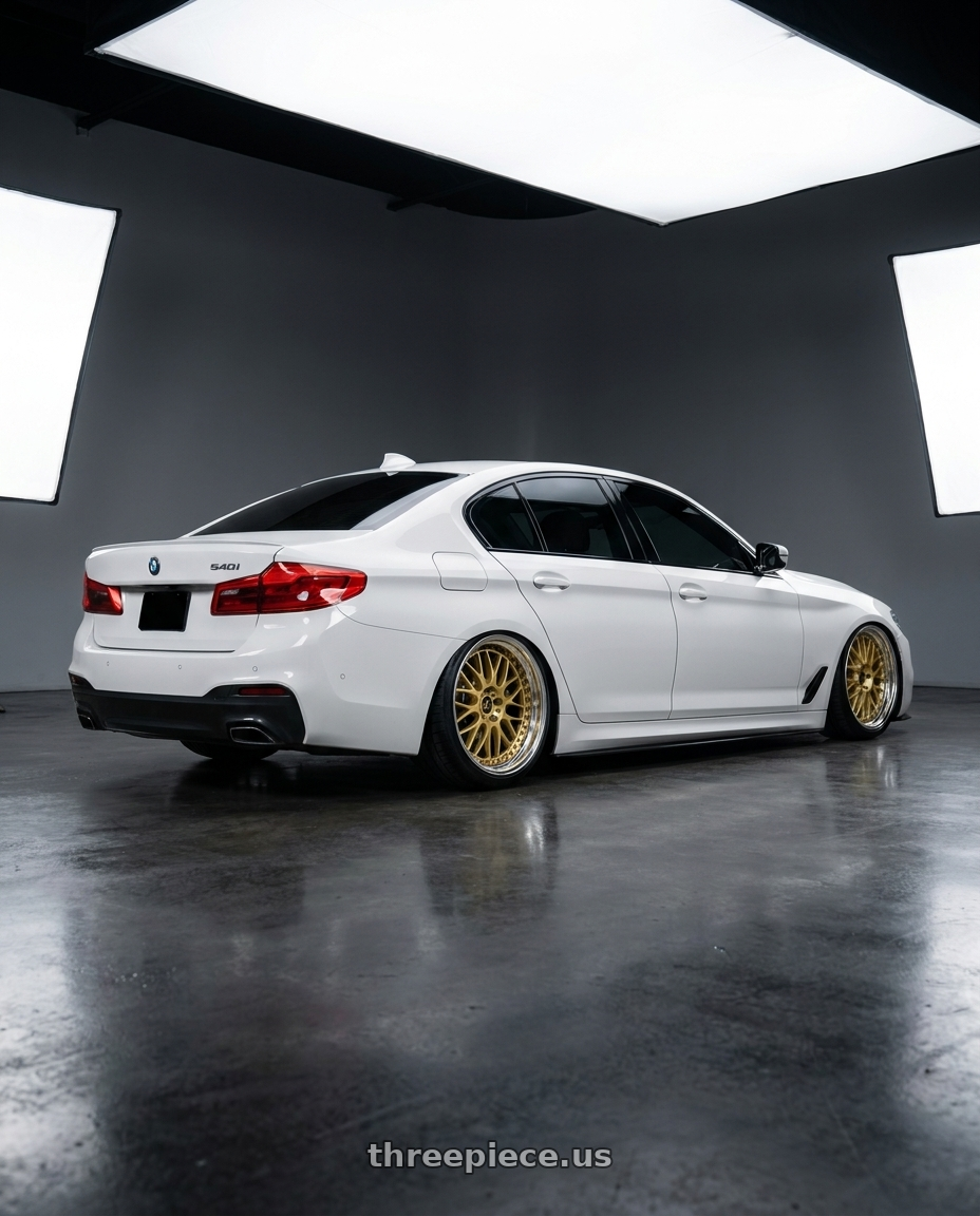 2019 BMW 540i Alpine white with Work Vs-Xx 5x112 19x9+38 O Disk Gold wheels rear three quarter view slight stretch tires