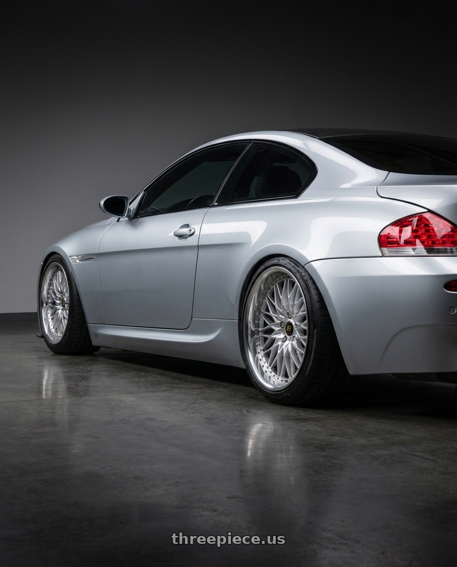 2007 BMW M6 with Work Vs-Xv 5x120 21x11+21 O Disk Silky Rich Silver wheels rear three quarter view slight stretch tires