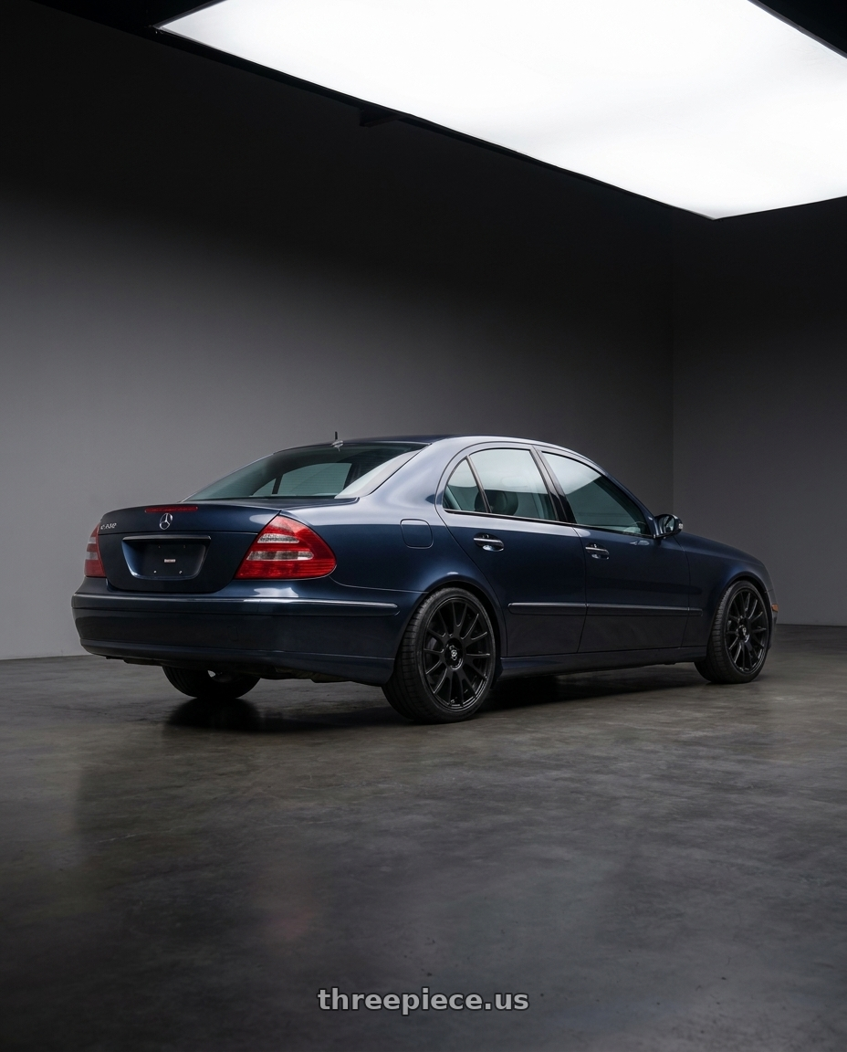 2002 Mercedes Benz E240 Avantgarde with Motegi MR118 MS7 5X112 18X8 +32 MATTE BLACK wheels rear three quarter view square tires