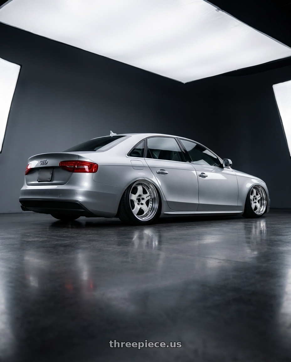 2016  Audi A4  with Work Meister S1 3P 5x112 18x8.5+35 L Disk White wheels rear three quarter view extreme stretch tires