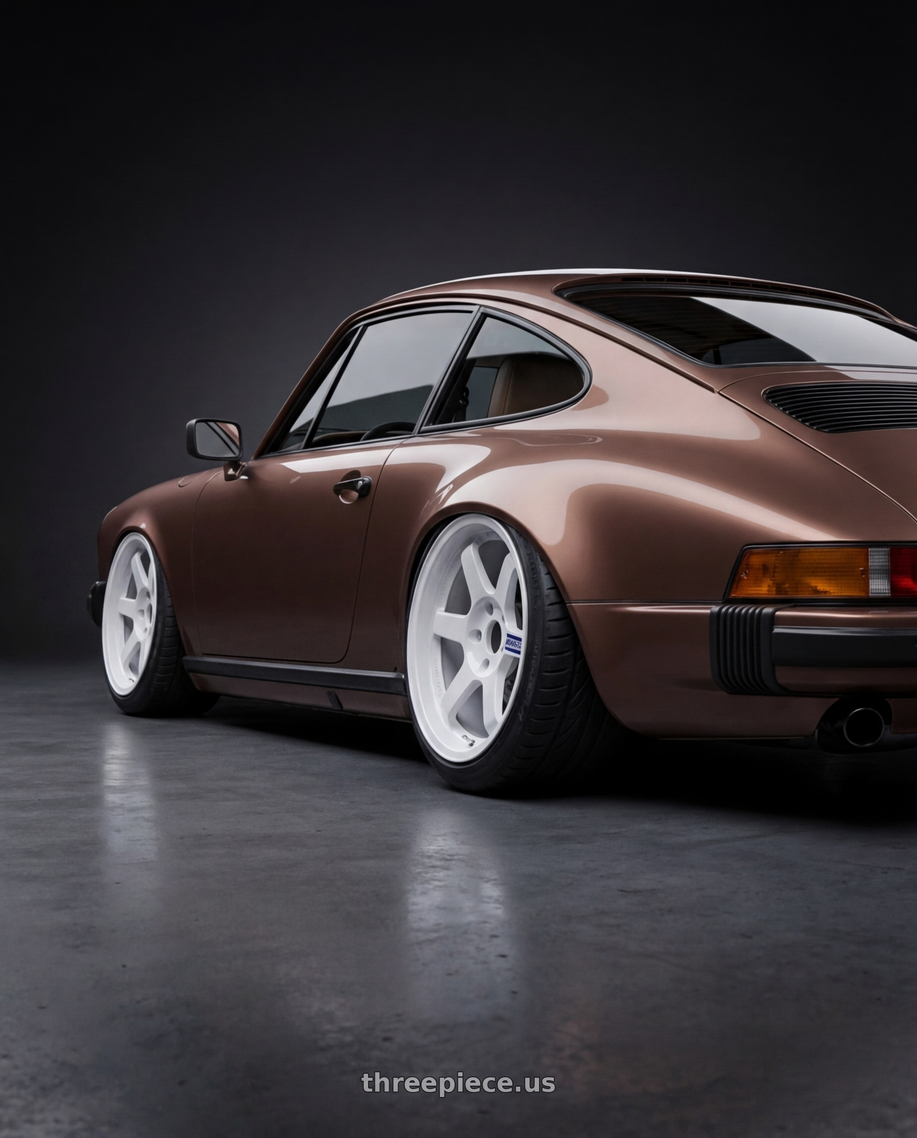 1980 Porsche 911 with Volk Racing TE37 Gravel 5x114.3 15x7.0+35 White wheels rear three quarter view extreme stretch tires