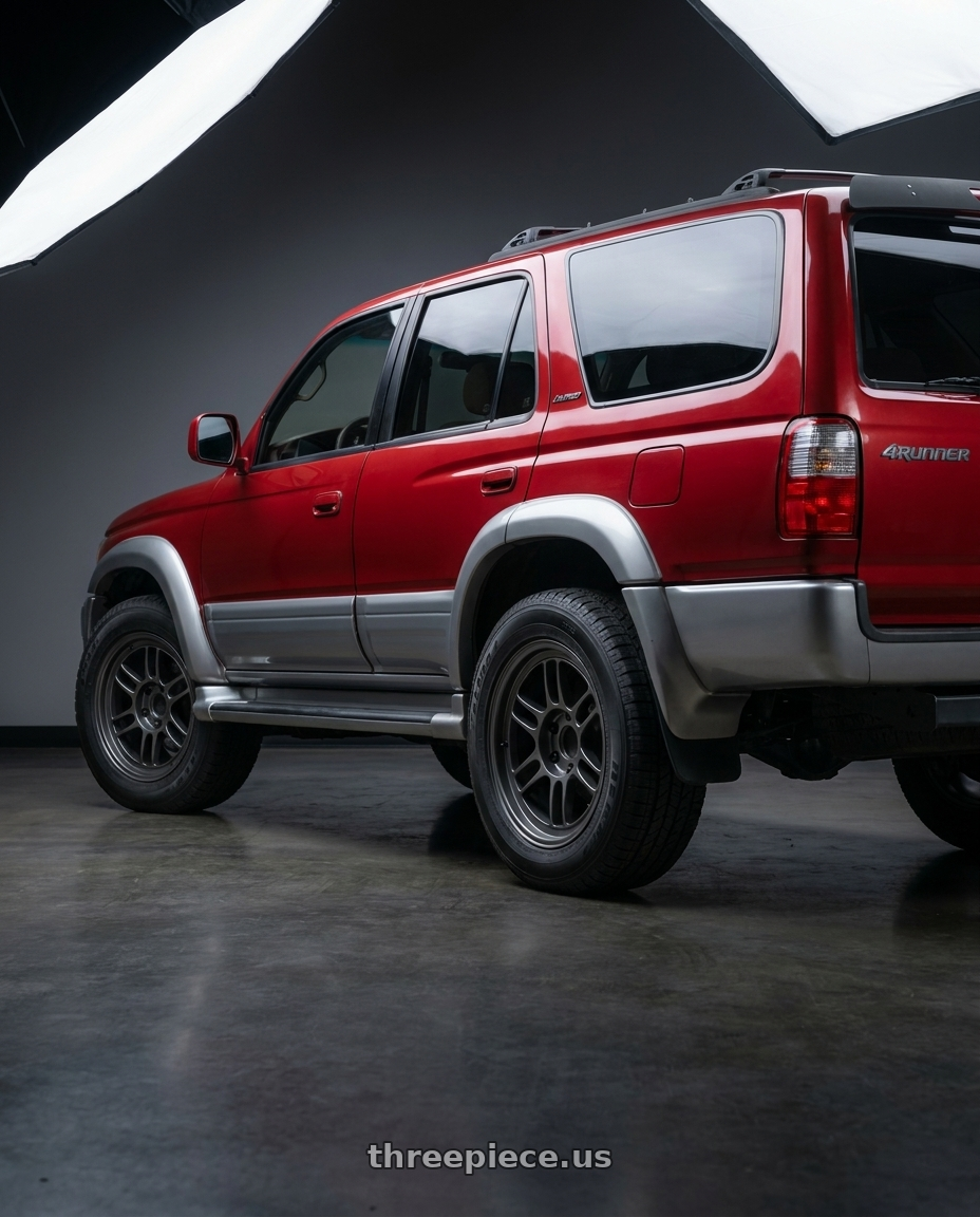 1997 Toyota 4Runner Limited  with Enkei RPT1 6x135 17x9+12 Matte Dark Gunmetallic wheels rear three quarter view square tires