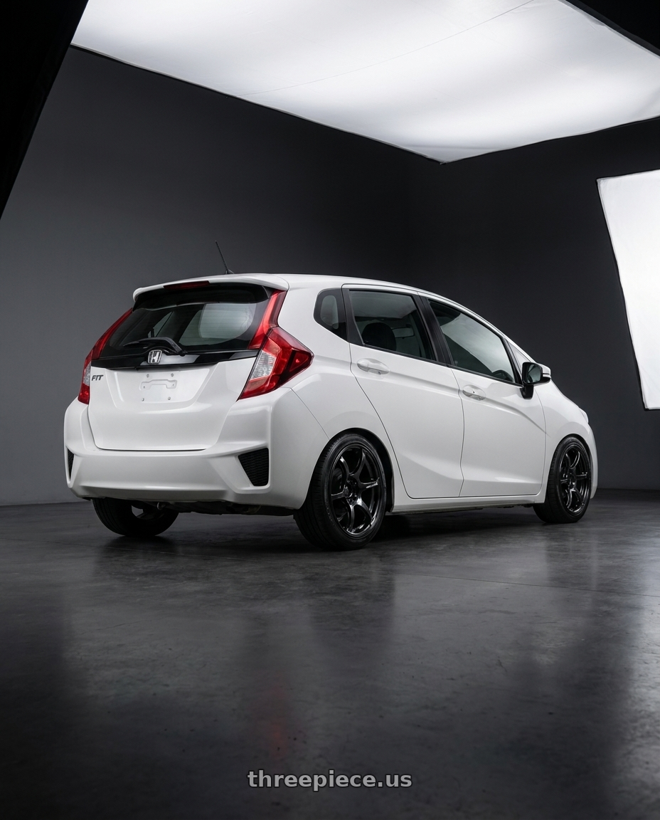 2015 Honda Fit White with Advan RGIII 4x100 18x7.0+42 Gloss Black wheels rear three quarter view square tires