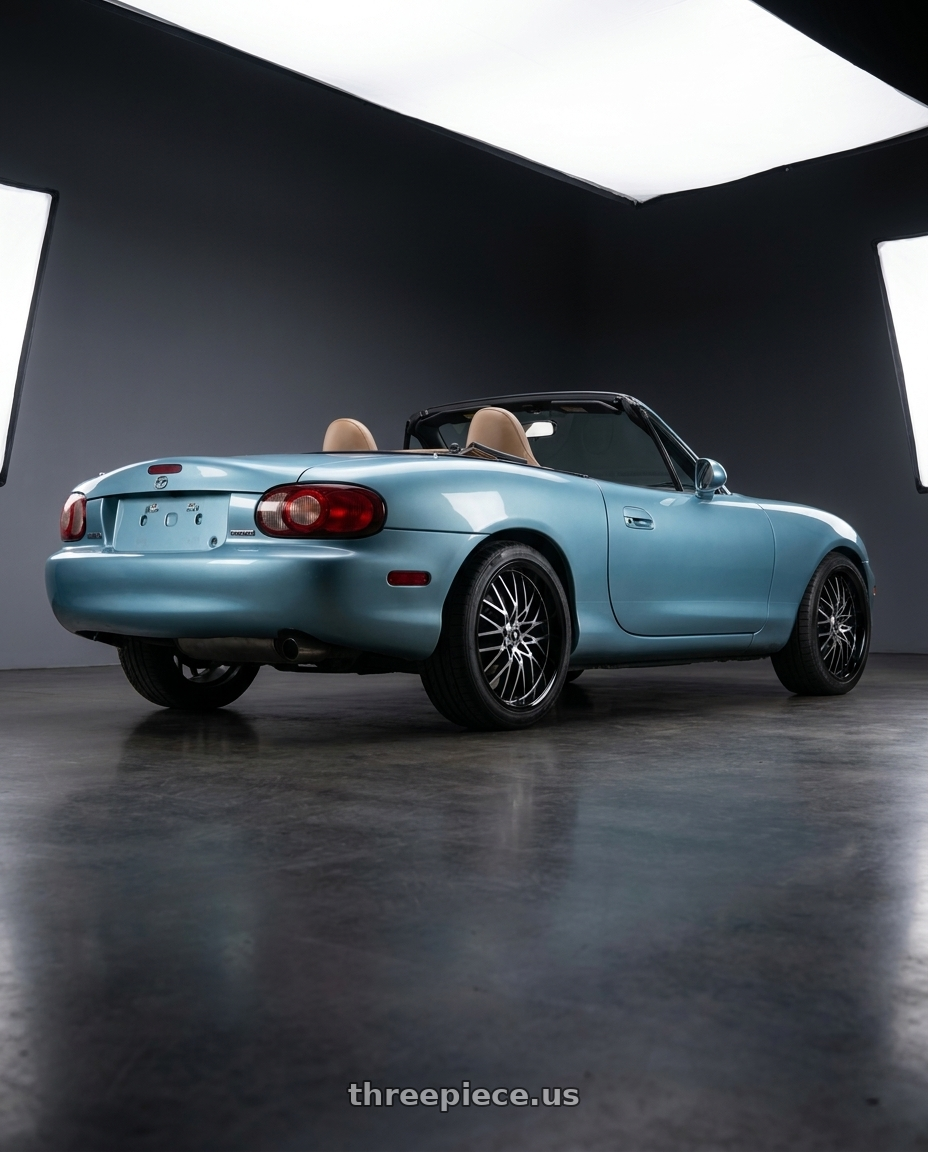 2002 Mazda Miata with Konig Lace 4X100/4X114.3 15x6.5+38 Black/Machine Spoke wheels rear three quarter view square tires