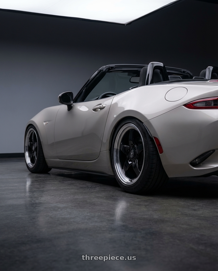 2021 Mazda MX-5 Miata ND with Forgestar D5 Drag 5x114.3 17x7 +6 Gloss Black Machined wheels rear three quarter view slight stretch tires