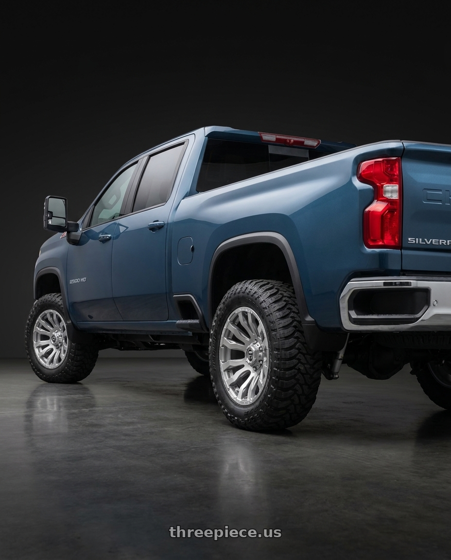 2026 Chevy Silverado 2500 with Fuel 1PC D693 BLITZ 8X170 20X10 -18 PLATINUM wheels rear three quarter view meaty tires