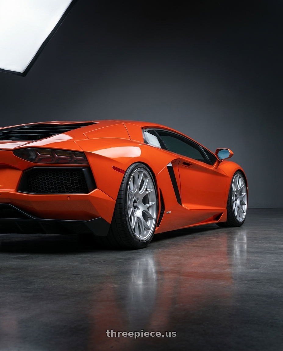 2012 Lamborghini Aventador LP700-4 with BBS CH-R 5x120 20x10.5 +24 Brilliant Silver Polished Rim Protector wheels rear three quarter view square tires