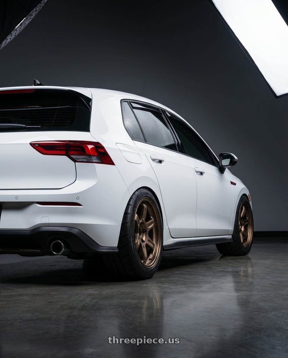 2022 Volkswagen GTI with Volk Racing 21C 5x114.3 18X9+20  Bronze wheels rear three quarter view meaty tires