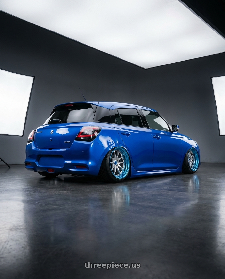 2025 Suzuki Swift with Work Emotion CR 3P wheels rear three quarter view slight stretch tires