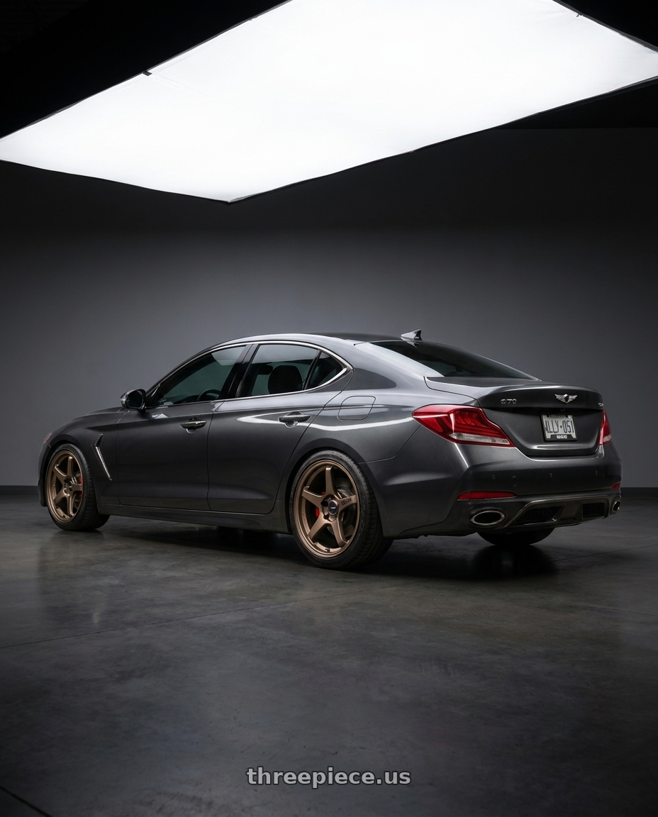2019 Genesis G70 with Enkei TS-5 5x114.3 18x9.5+38 Bronze wheels rear three quarter view slight stretch tires