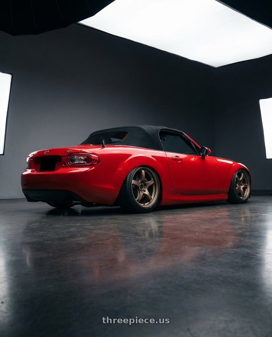 2012 Mazda MX-5 Miata NC with Gram Lights 57CR 5x114.3 17x9+38 Bronze II wheels rear three quarter view slight stretch tires