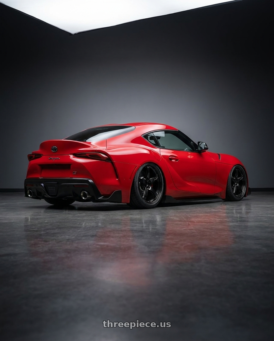 2023 Toyota GR Supra with Gram Lights 57CR 5x112 19x10.5+35 Glossy Black wheels rear three quarter view slight stretch tires