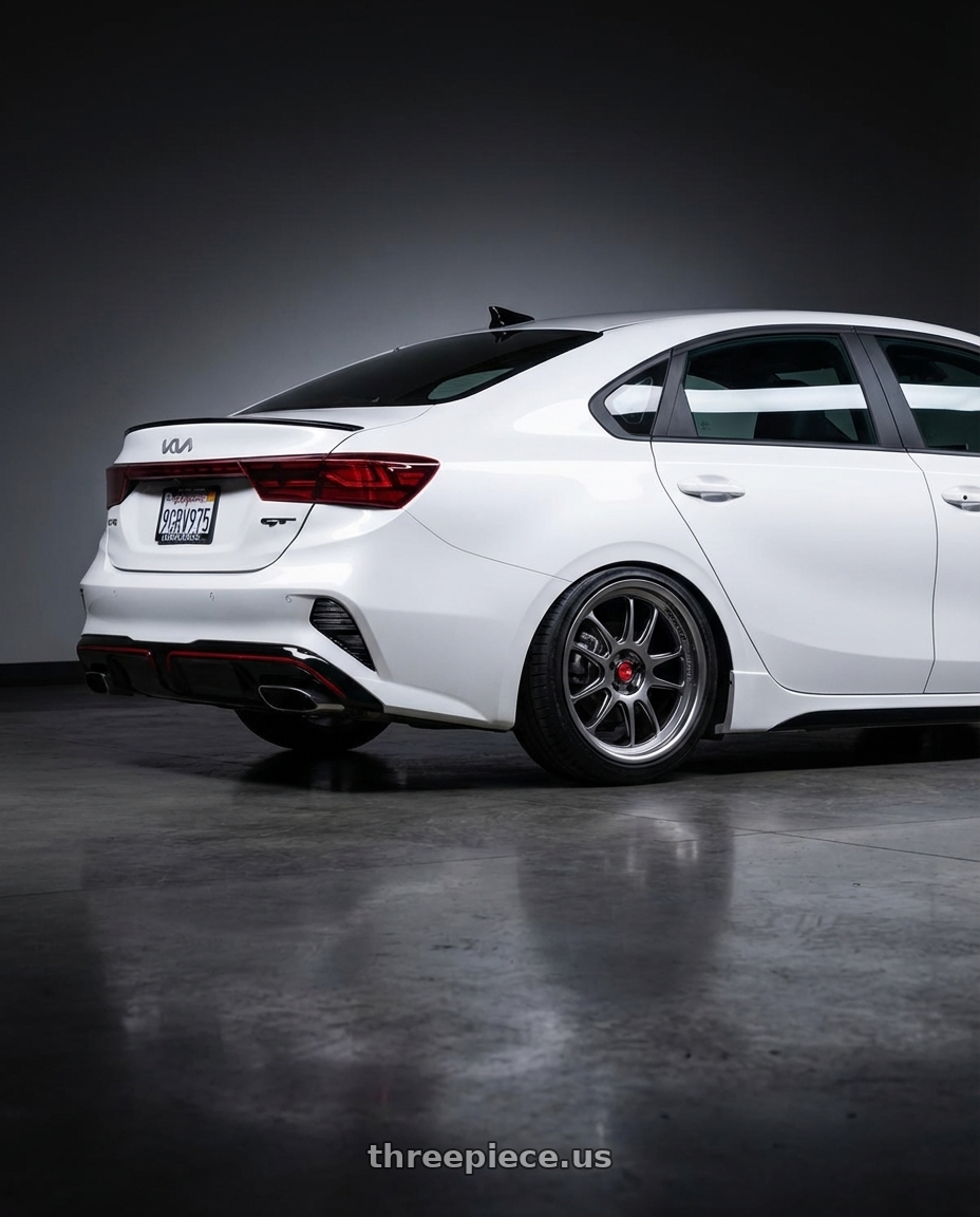 2023 kia forte gt with Aodhan AH07 5x114.3 18x8.5+35 Hyper Black wheels rear three quarter view slight stretch tires