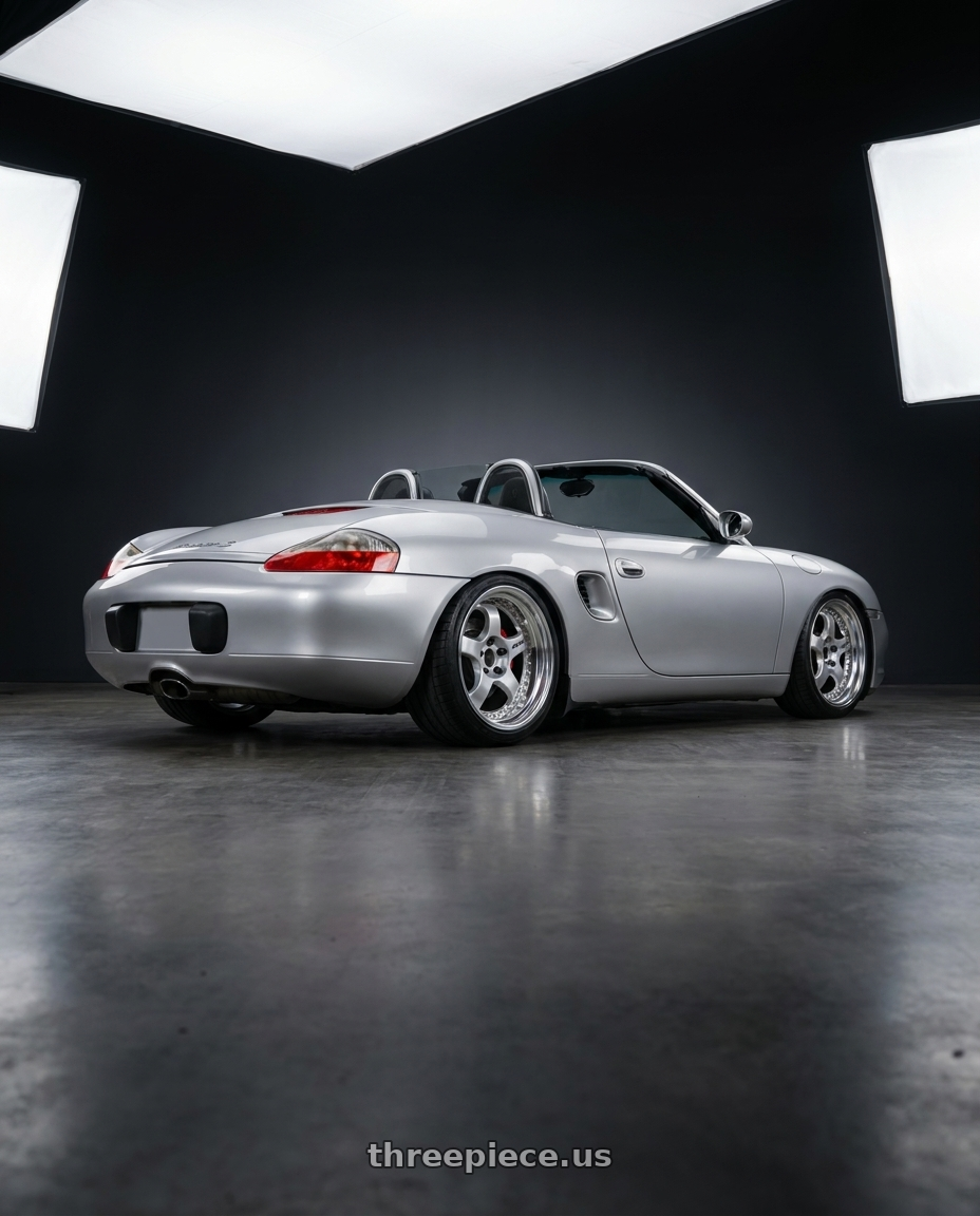 2001 porsche boxster s with Work Meister S1 3P 5x130 19x10+4 O Disk Silver wheels rear three quarter view slight stretch tires