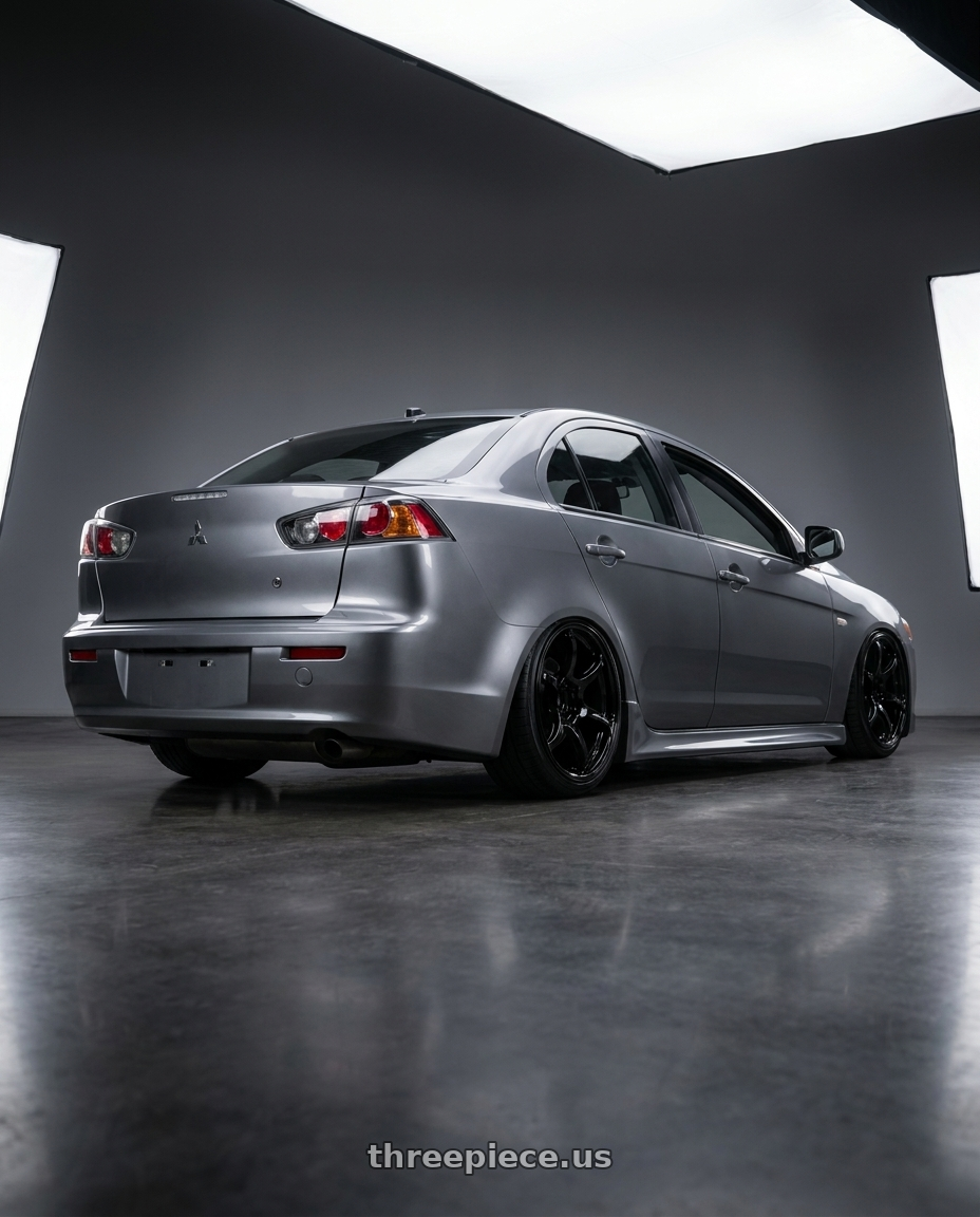 2014 Mitsubishi Lancer Ralliart with Advan RGIII 5x114.3 18x8.5+31 Gloss Black wheels rear three quarter view slight stretch tires