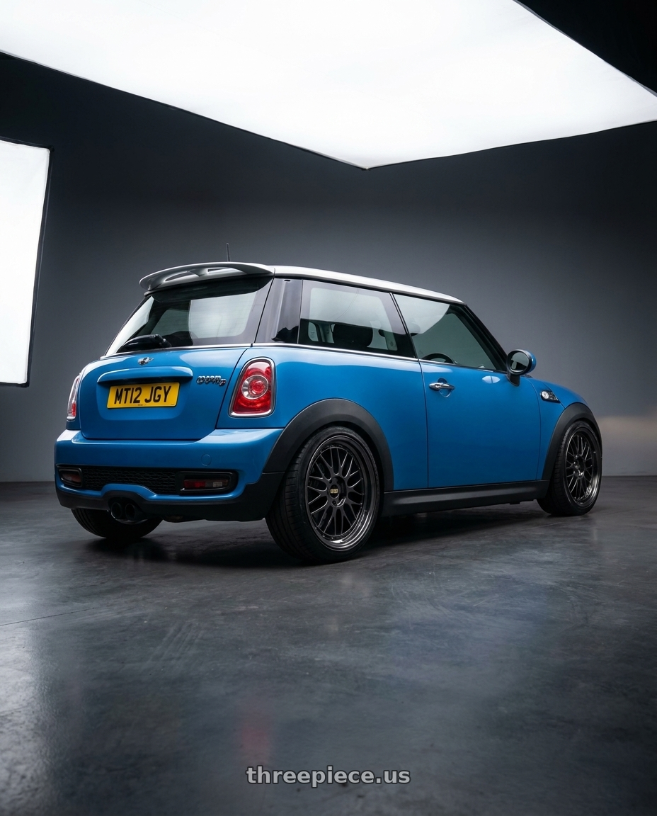 2012 mini cooper with BBS LM 5x114.3 18x9.0+42 Diamond Black wheels rear three quarter view slight stretch tires