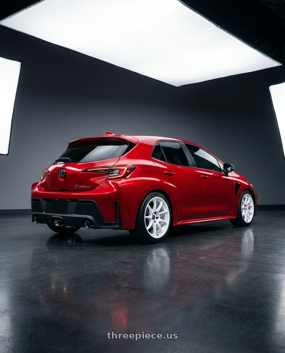 2025 Toyota GR Corolla with Work Emotion Zr10 5x114.3 18x9.5 +30 Azure White wheels rear three quarter view square tires