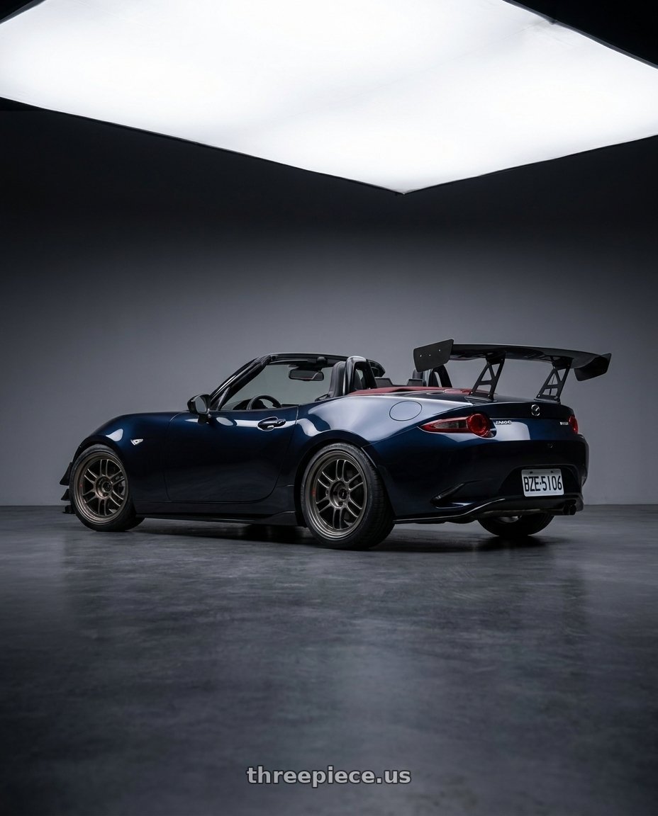 2021 Mazda Mx5  with Enkei RPF1RS 5x114.3 18x9.5+12 Matte Gunmetal wheels rear three quarter view slight stretch tires