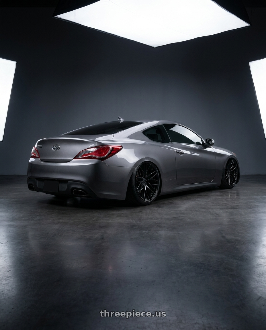 2014 Hyundai Genesis Coupe with Avant Garde Wheels M520R 5X114.3 19x9.5 +40 Gloss Black wheels rear three quarter view slight stretch tires