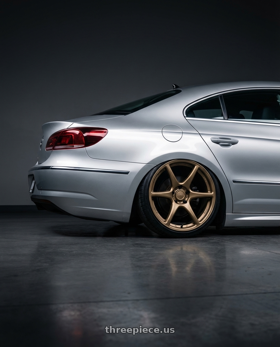 2015 Volkswagen CC with Kansei K11B Tandem 5X112 19x9.5 22 Bronze wheels rear three quarter view slight stretch tires