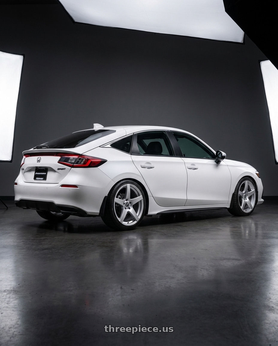 2026 Honda Civic Hatchback Sport with Forgestar CF5 5x110 18x8.5 +25 Gloss Silver wheels rear three quarter view square tires