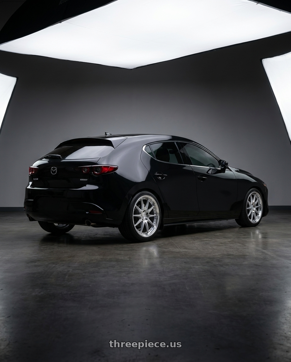 2024 Mazda Mazda3 with Aodhan DS07 5x114.3 18x8.5+35 Silver w/Machined Face wheels rear three quarter view square tires