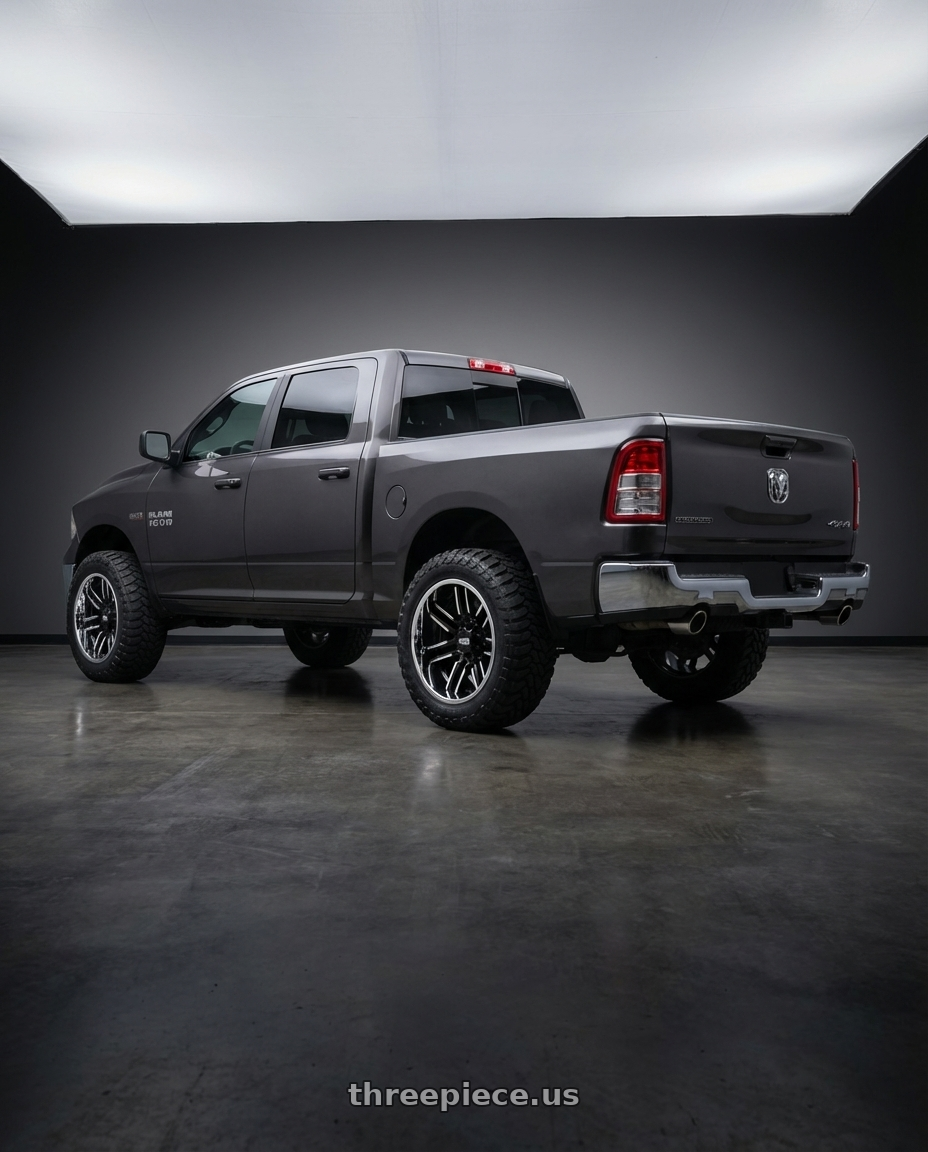 2024 Ram 1500 with Moto Metal MO202 6X139.7 22X12 -44 GLOSS BLACK MACHINED CENTER CHROME LIP wheels rear three quarter view meaty tires