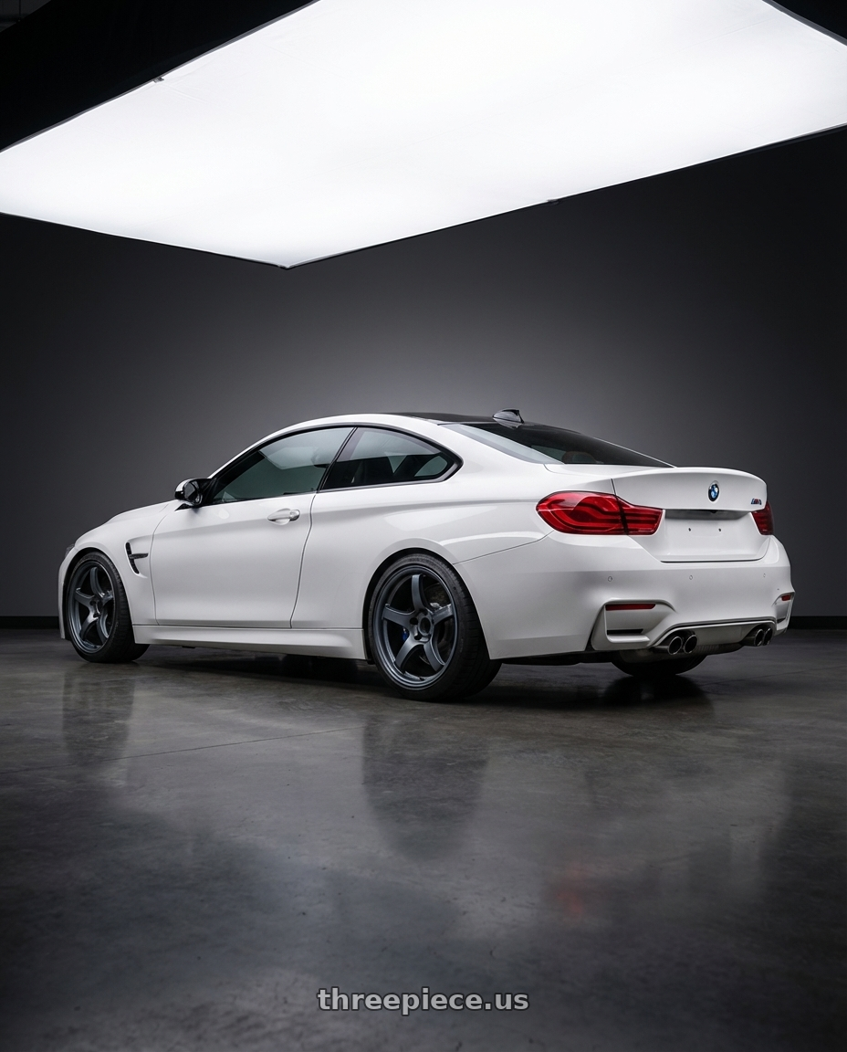 2018 BMW M4 F82 with Gram Lights 57CR 5x120 19x10.5+22 Gunblue II wheels rear three quarter view square tires