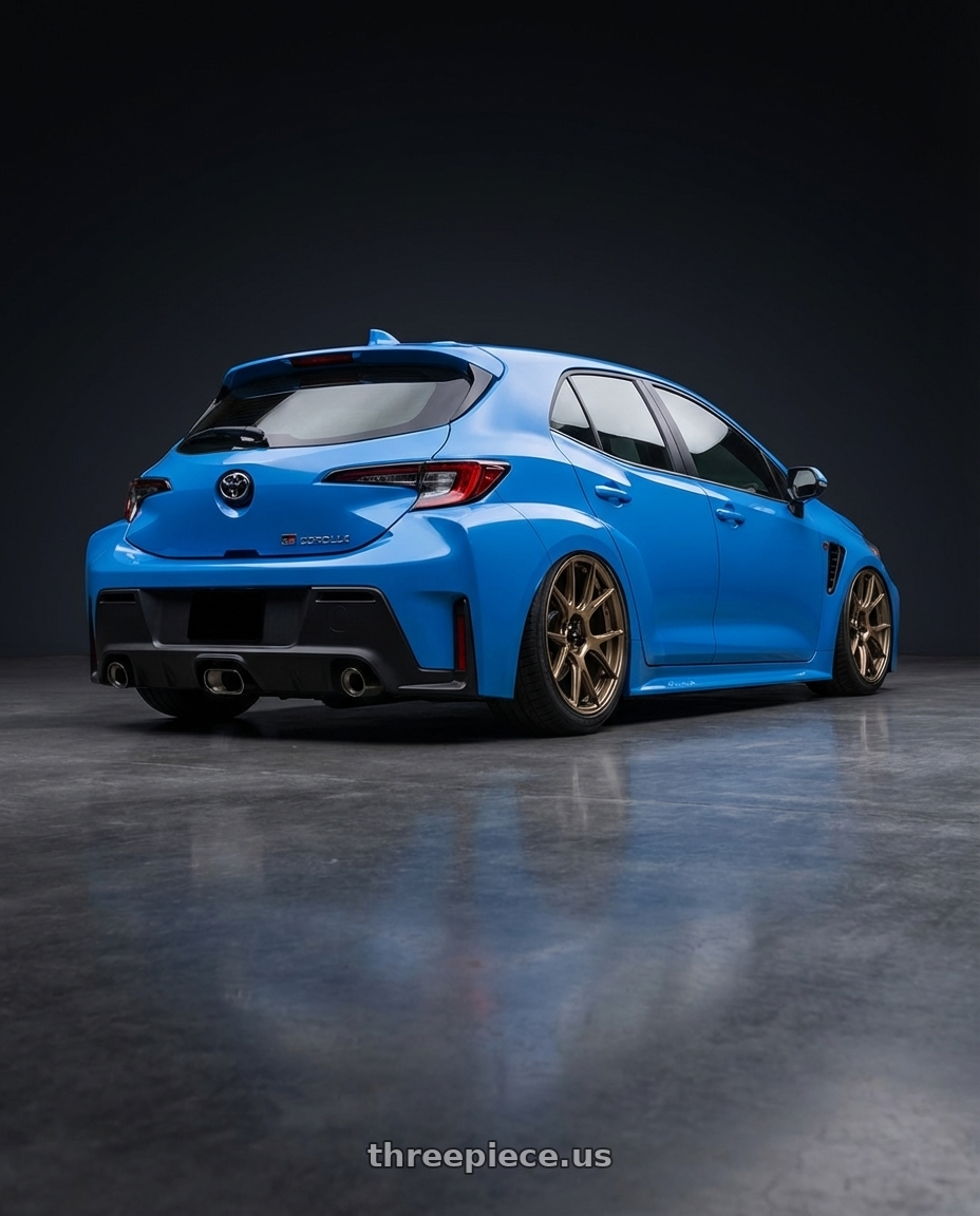 2024 Toyota GR Corolla with Konig Ampliform 5x114.3 18x10+20 Gloss Bronze wheels rear three quarter view slight stretch tires