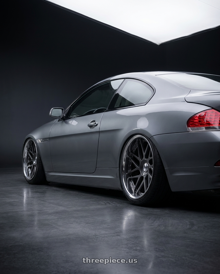 2006 BMW 650i with Leon Hardiritt Geist 20x12.0-6 High Disk wheels rear three quarter view extreme stretch tires