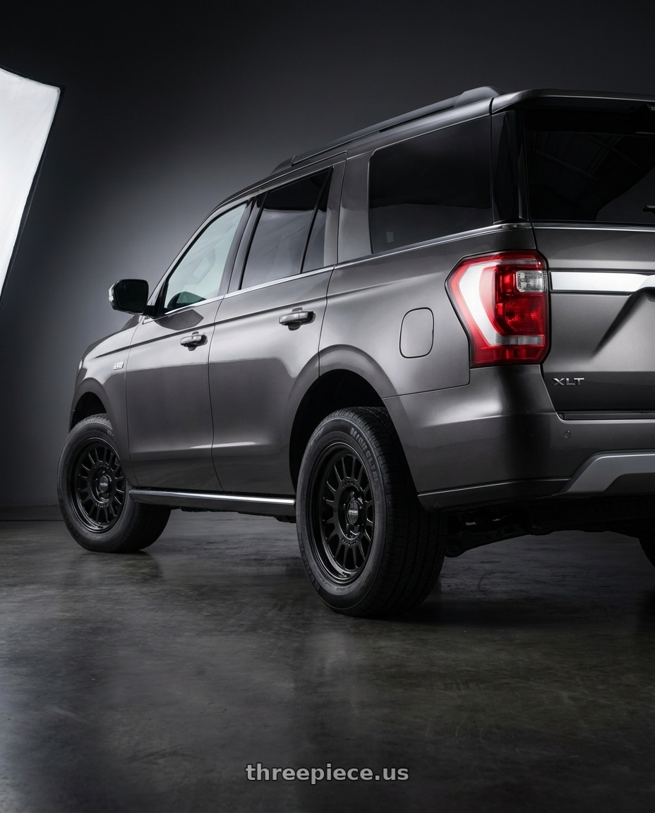 2020 Ford Expedition Max XLT with Method Race Wheels 318B 6X135 17x8.5 +0 GLOSS BLACK wheels rear three quarter view square tires
