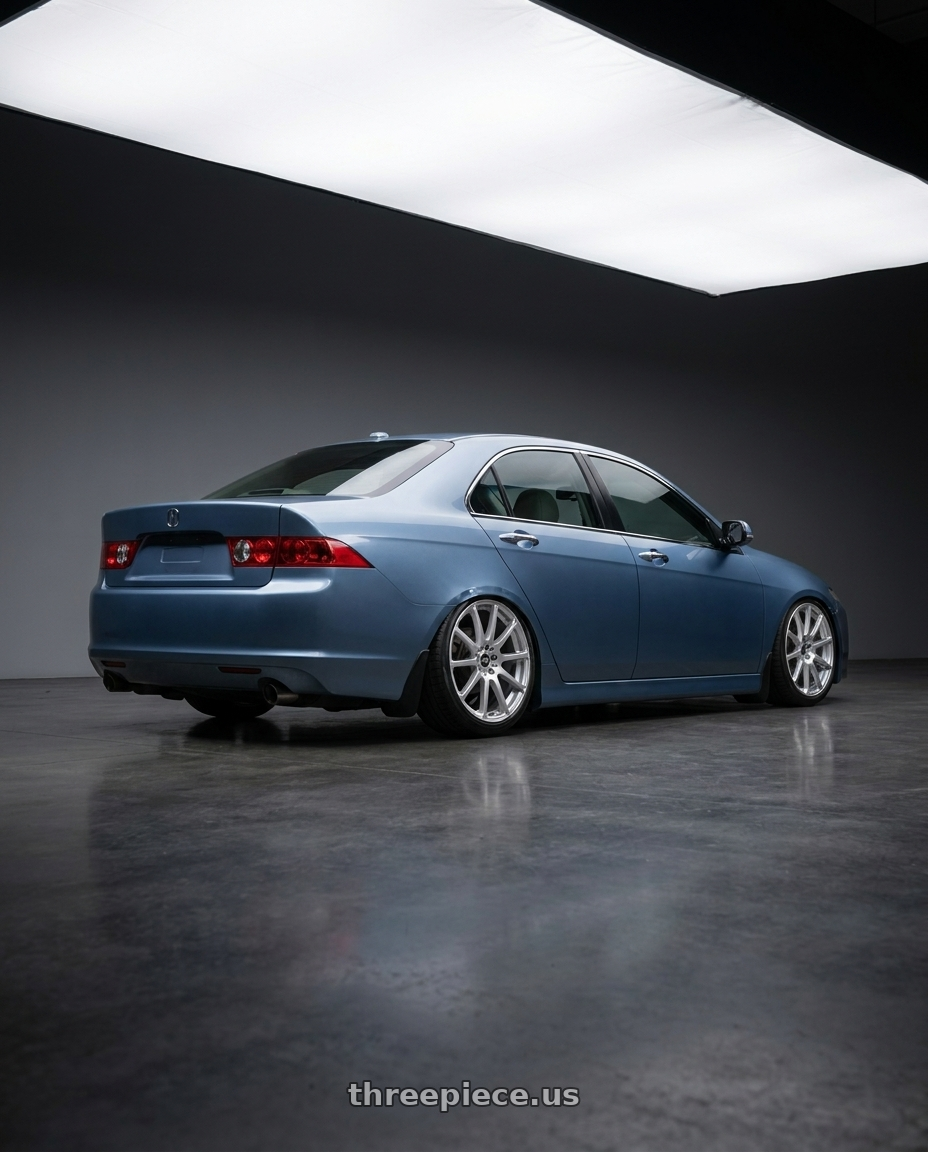 2005 Acura Tsx with Enkei EDR9 5x100/114.3 18x7.5+45 Silver wheels rear three quarter view slight stretch tires