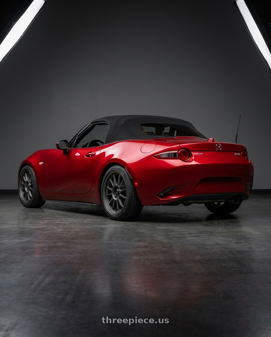 2016 Mazda Miata with Konig Hypergram 4x100 16x7.5+38 Matte Grey wheels rear three quarter view square tires