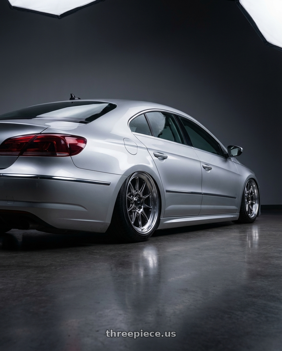 2015 Volkswagen CC with Konig Countergram 5x112 19x8.5+43 Hyper Chrome / Machined Lip wheels rear three quarter view slight stretch tires