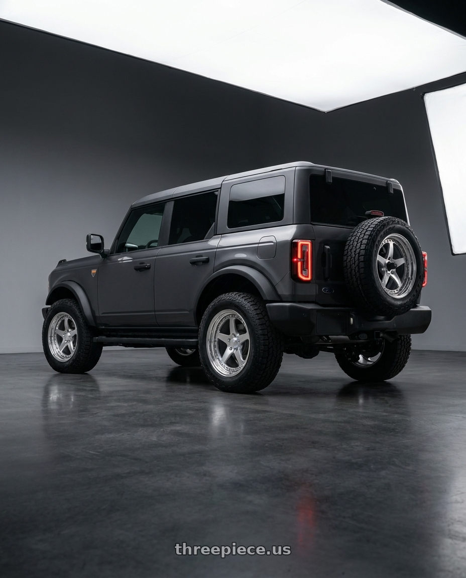 2023 Ford Bronco  with CCW SA50 6x139.7 17x8 +30 Polished wheels rear three quarter view square tires