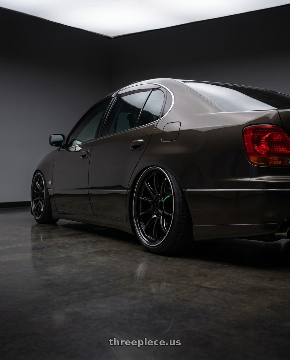 2000 lexus gs300 with Work Emotion Zr10 5x114.3 18x9.5 +38 Black Diamond Lip Cut wheels rear three quarter view slight stretch tires