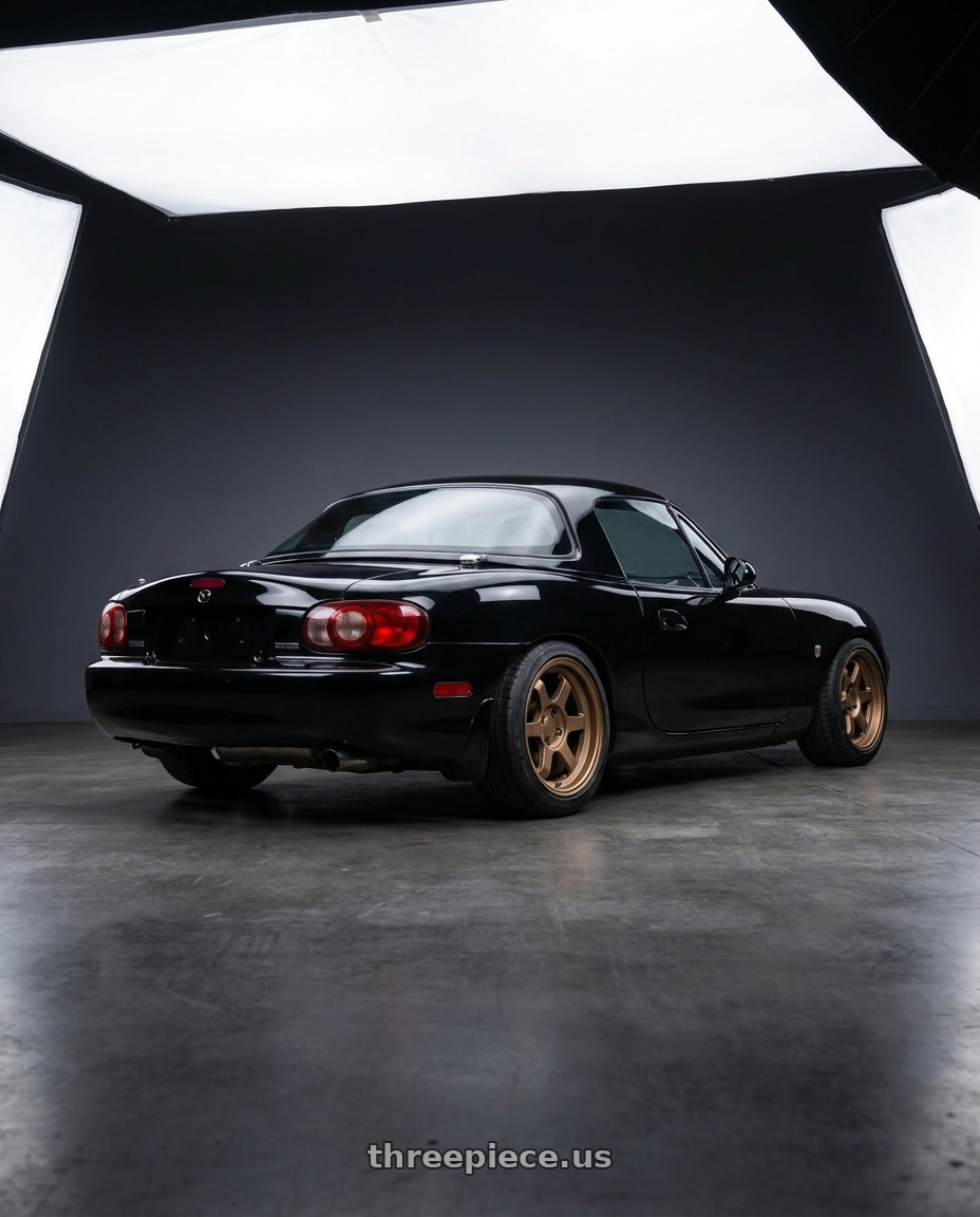 2001 Mazda MX-5 NBFL with 9six9 SIX-1 Deep 4x100 15X8 +20 Matte Bronze wheels rear three quarter view slight stretch tires