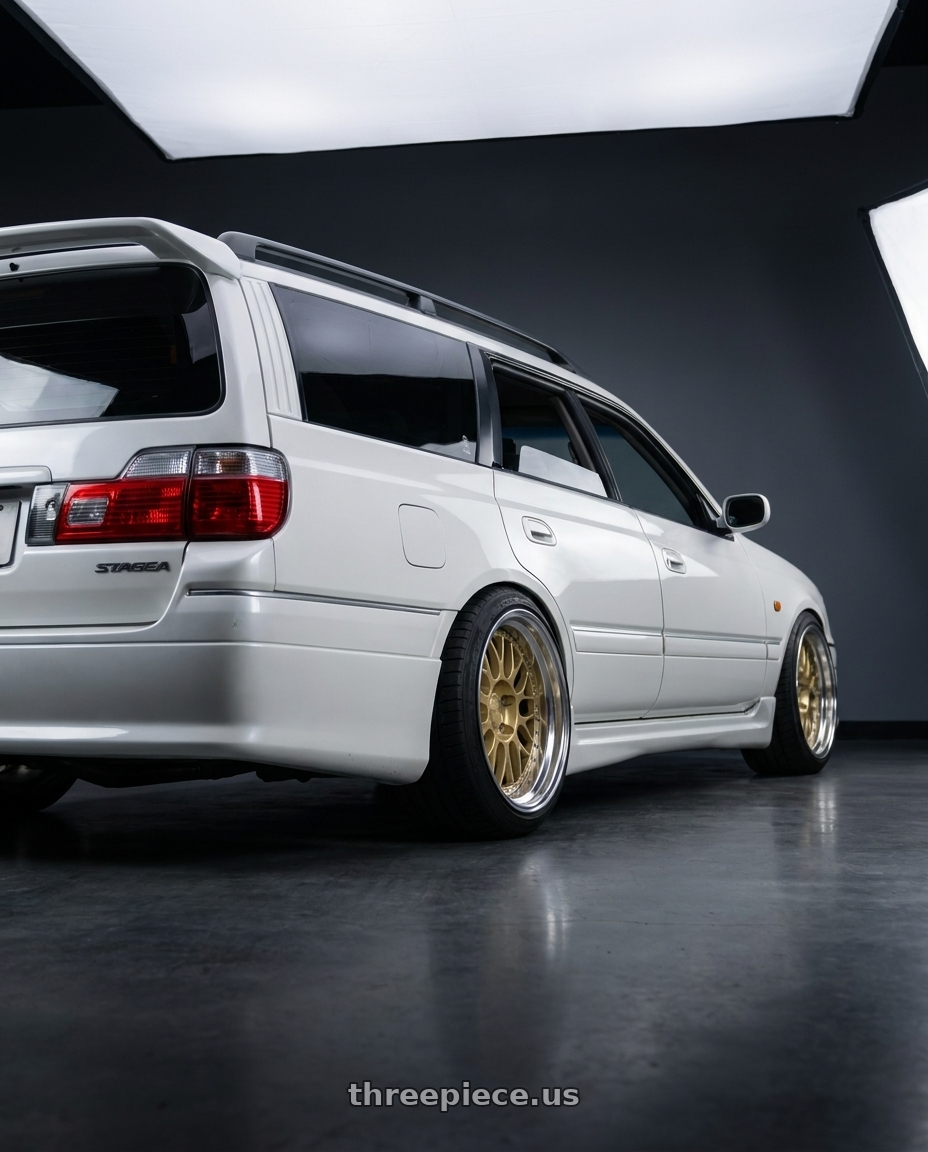 1998 Nissan Stagea with Work Brombacher Mesh wheels rear three quarter view meaty tires