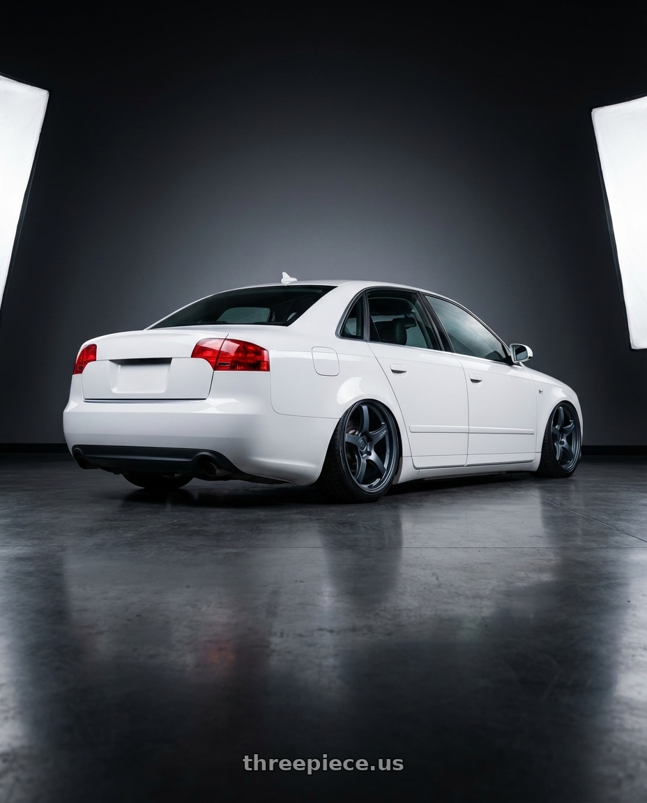 2010 Audi A4 B7 with Gram Lights 57CR 5x112 19x9.5+25 Gunblue II wheels rear three quarter view slight stretch tires