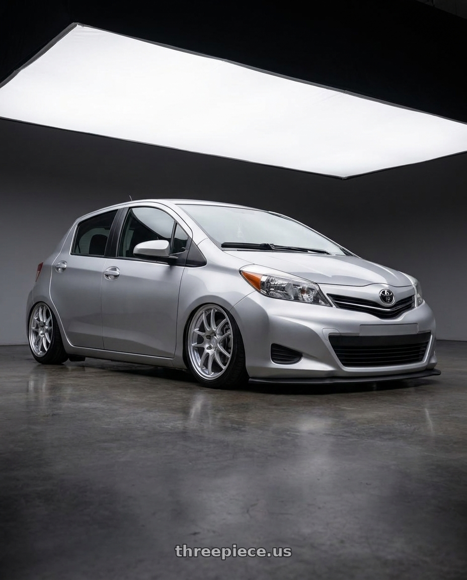 2015 Yaris toyota with Enkei PF01 4x100 16x7+43 Silver wheels