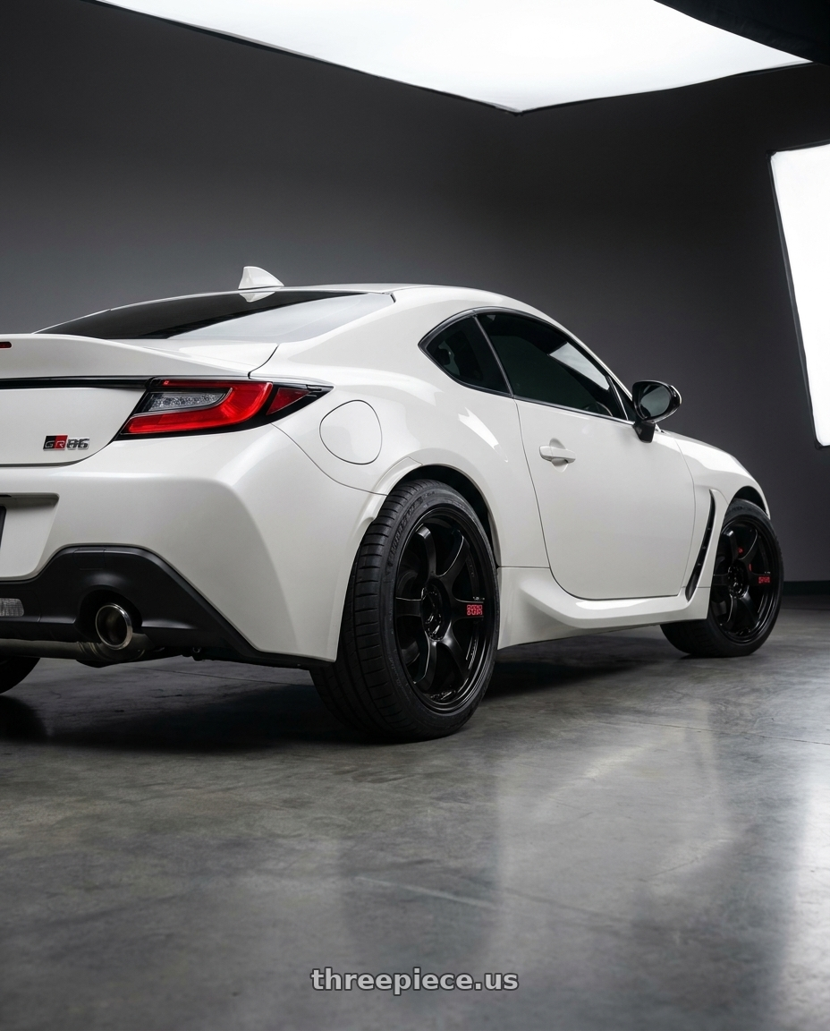 2026 Toyota gr86  with Gram Lights 57DR 5x100 18x8.5 +37 SEMI GLOSS BLACK wheels rear three quarter view square tires