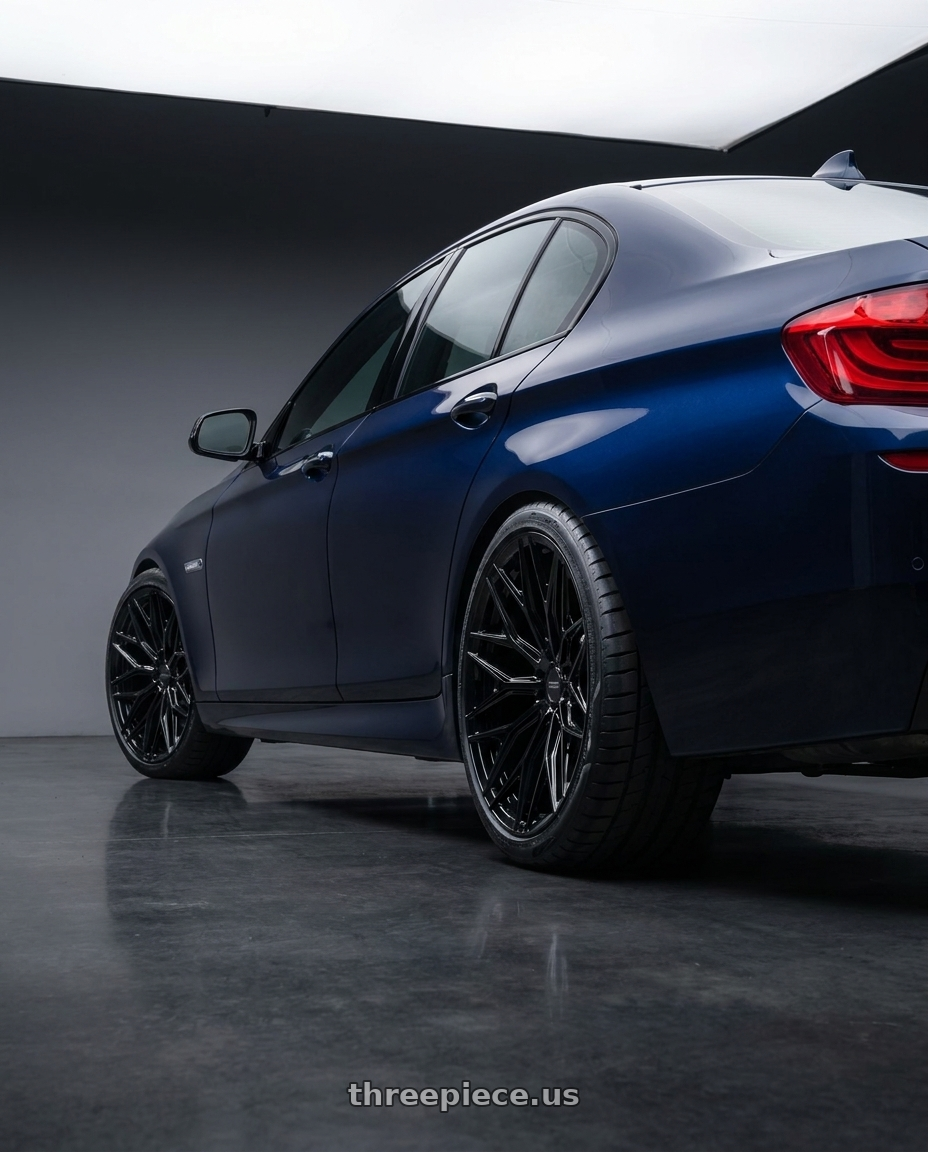 2012 BMW 535i with VOSSEN HFX-6 8X170 22x10 +-18 GLOSS BLACK wheels rear three quarter view meaty tires