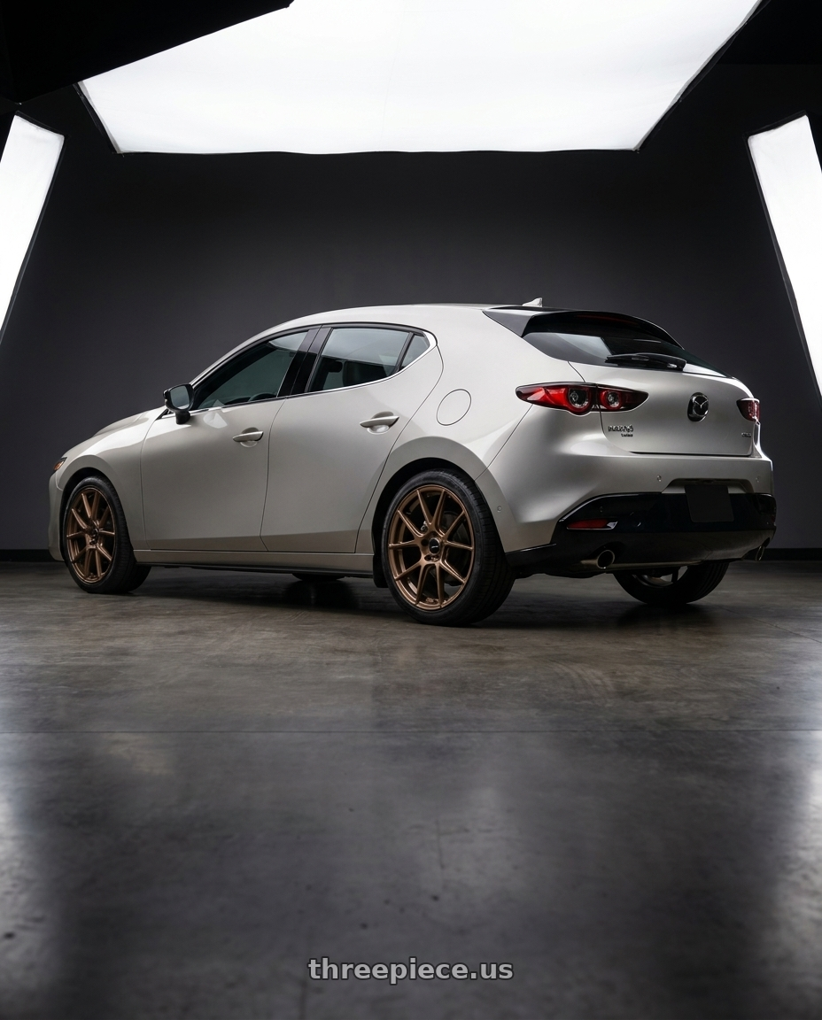 2024 Mazda 3 Turbo Premium with Enkei TS-V 5x114.3 18x8.5+38 Bronze wheels rear three quarter view square tires