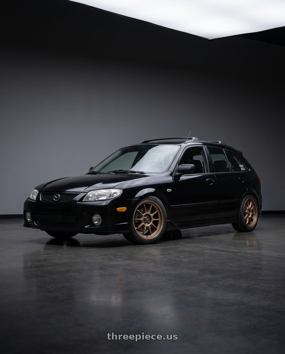 2002 Mazda Protege5 with Konig Hypergram 5x114.3 16x7.5+38 Race Bronze wheels