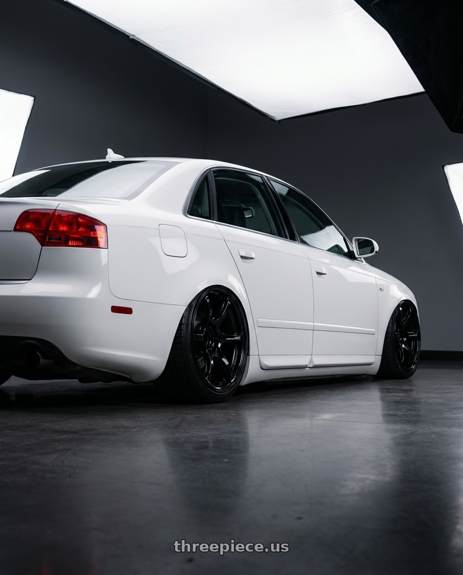 2010 Audi A4 B7 with Advan RGIII 5x112 19x8.5+45 Gloss Black wheels rear three quarter view slight stretch tires