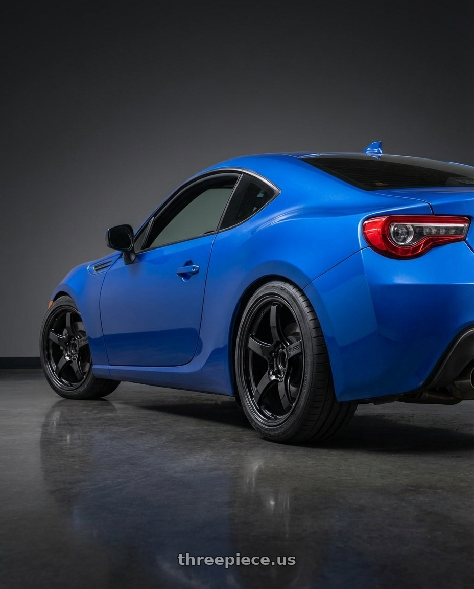 2017 Subaru BRZ with Gram Lights 57CR 5x100 17x9+38 Glossy Black wheels rear three quarter view square tires