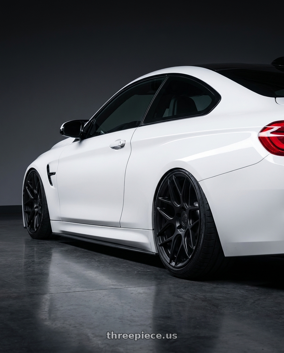 2018 BMW M4 F82 with Aodhan AFF2 5x120 19x9.5+35 Matte Black wheels rear three quarter view slight stretch tires