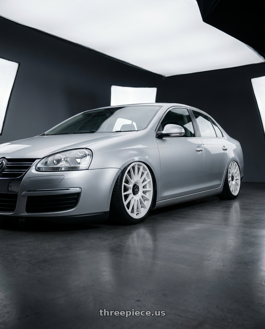 2009 Volkswagen Jetta GLI MK5 with fifteen52 PODIUM 5x112 / 5x120 18x8.5 +35 RALLY WHITE (GLOSS WHITE) wheels